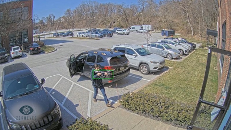 Detecting a gun in a parking lot.