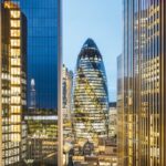 "The Gherkin" building among high rise buildings in London