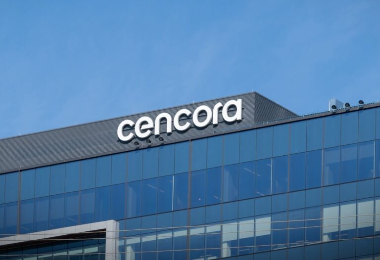 a photo of cencora's logo at the top of its headquarters in PA