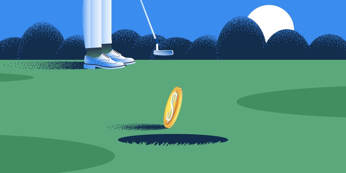 Coin rolling into a golf hole.