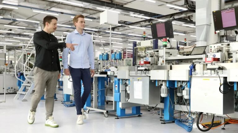 EthonAI co-founders Julian Senoner (CEO, right) and Bernhard Kratzwald (CTO, left) at a Siemens factory in Zug, Switzerland