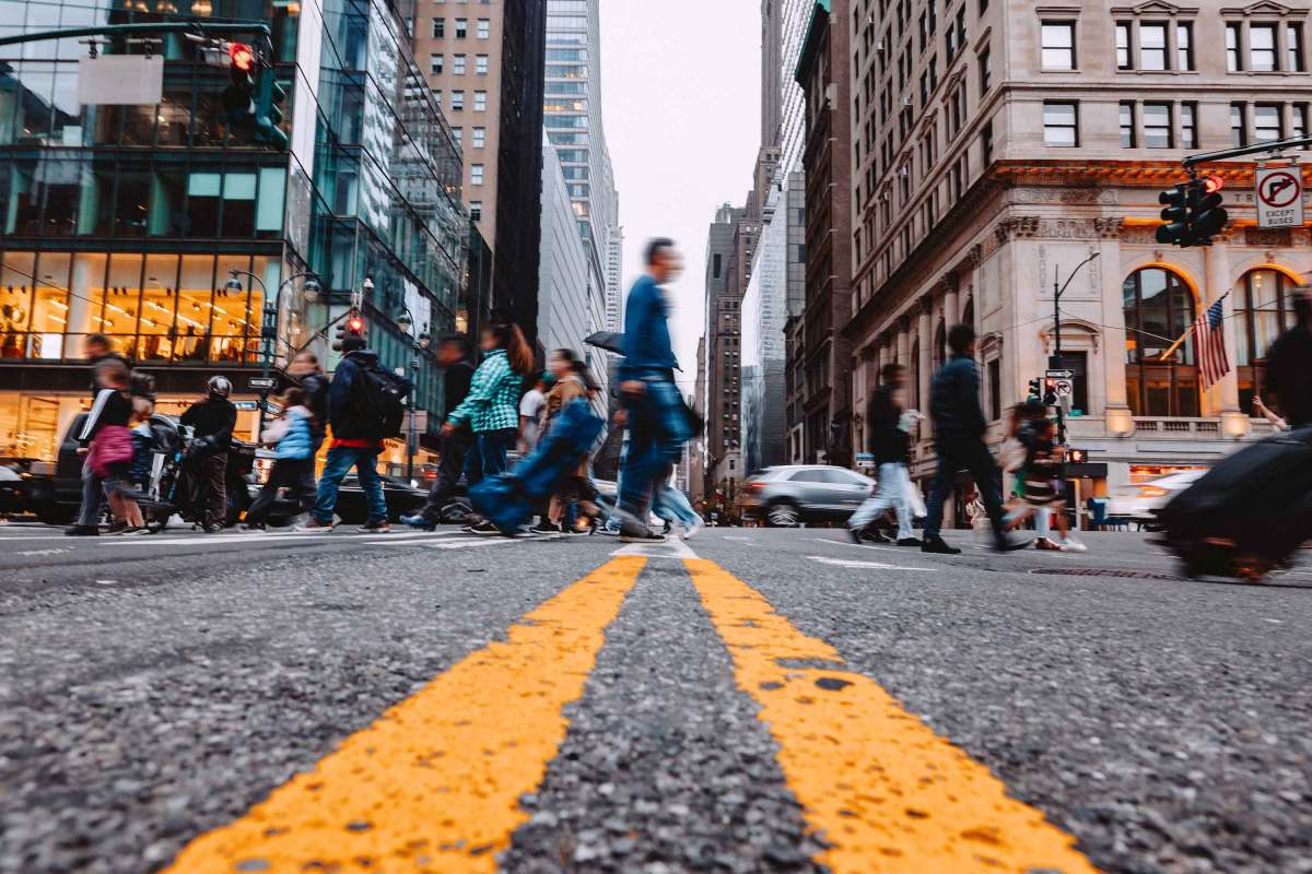 People cross the street in Manhattan.