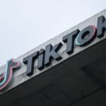 The TikTok logo is displayed on signage outside TikTok social media app company offices in Culver City, California.