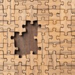 Wooden Jigsaw Puzzle with missing pieces; how to handle layoffs humanely