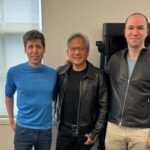 At OpenAI's headquarters, from left to right, Sam Altman, Jensen Huang, and Greg Brockman stand with the first Nvidia DGX H200 AI processor, a pivotal innovation set to accelerate AI research and applications. (credit: