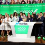 Robinhood's Baiju Bhatt and Vlad Tenev celebrate after ringing the bell on Robinhood Markets IPO Listing Day on July 29, 2021 in New York City.